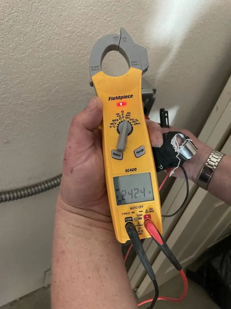Voltage testing with clamp meter during Generator Installation in Roselle Park